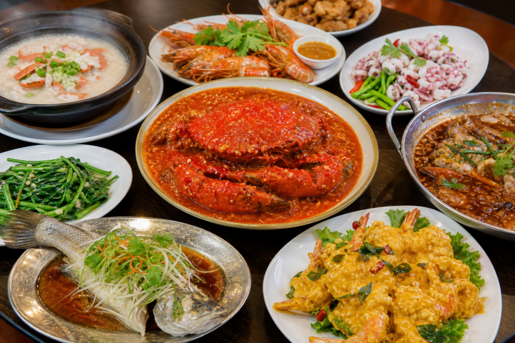 Singaporean zi-char seafood feast — chili crab and salted-egg prawns